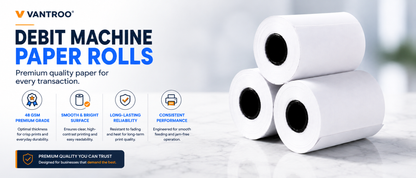 Three white Vantroo debit machine paper rolls stacked on a light marble surface against a bright, blurred background. The left side features product information with icons and text detailing the paper's premium quality, smoothness, and reliability.